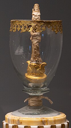 Galileo's finger preserved in a glass reliquary